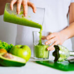 woman-transfuse-smoothie-to-glass-healthy-food-concept